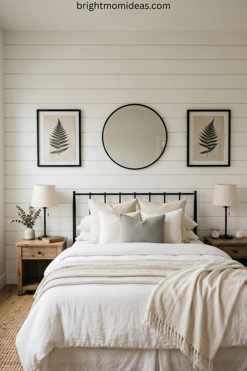 modern farmhouse bedroom wall decor with shiplap accent wall and black frames